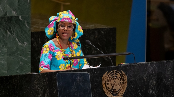 A woman speaking at a podium